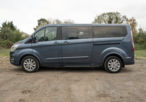 16A. Old shape tourneo 9-seater minivan - side